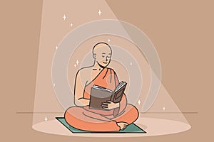 Buddhist monk reads ancient book sitting on rug.