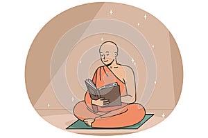 Buddhist monk reads ancient book sitting on rug.