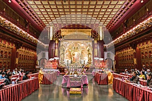 Buddhist monks perform ceremony inside Buddha Tooth Relic Temple