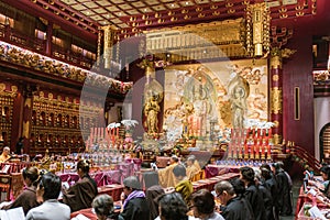 Buddhist monks perform ceremony inside Buddha Tooth Relic Temple