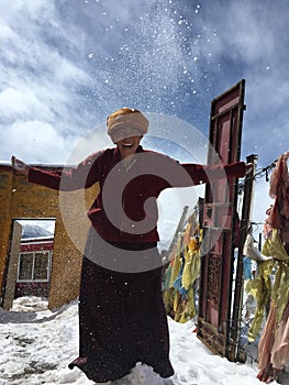 Buddhist nun in snow photo