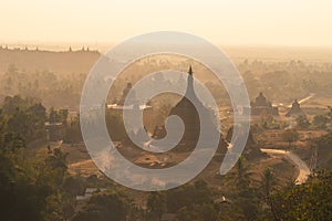 Buddhist pagoda and temple at sunset in Mrauk U ancient city, Rakhine state in Myanmar