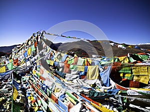 Buddhist prayer flags with blue sky