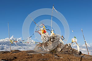 Buddhist prayer flags on a Buddhist chorten in.