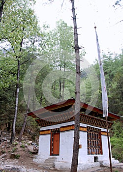 Buddhist prayer flags & house