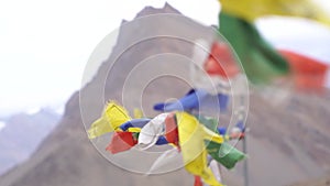 Buddhist prayer flags lungta in Spiti Valley and Ladakh. Flying prayer flags of Om Mani Padme Hum