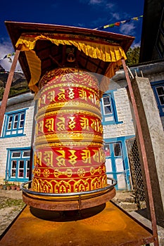 Buddhist prayer wheel with mantra in Nepal