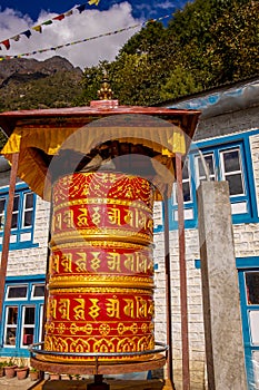 Buddhist prayer wheel with mantra in Nepal