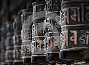 Buddhist prayer wheels at Swayambhunath Monkey temple - Kathmandu, Nepal