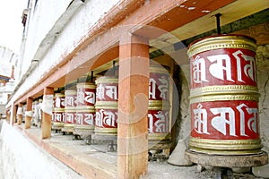 Buddhist Prayer wheels at the temple in Ladakh, India