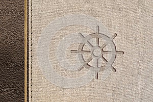 Buddhist religious design with leather and fabric with wheel engraved