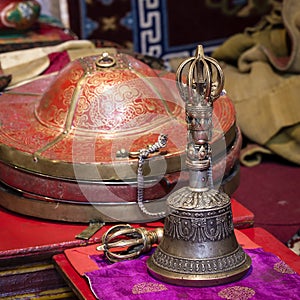 Buddhist religious equipment - Vajra Dorje and bell in tibetan monastery. Ladakh, Jammu Kashmir, India