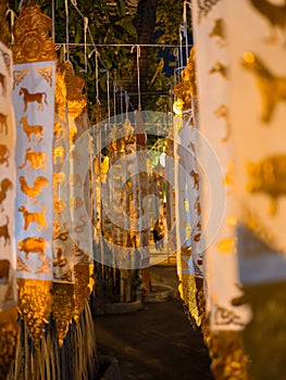 Buddhist religious ornaments hanging on the street during