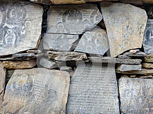Buddhist scripts written on the stones.