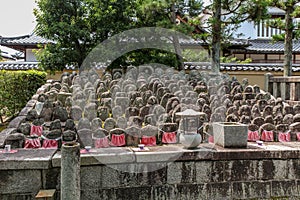 Buddhist sculpture with arrays of  statues of Buddha in Daitoku-ji