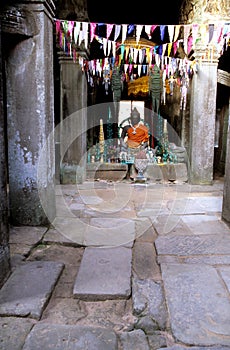 Buddhist statue- Angkor Wat ruins, Cambodia.