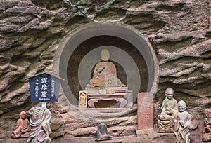 Buddhist statues in a cavity of Mount Nokogiri carved like the flames of the homa ritual.