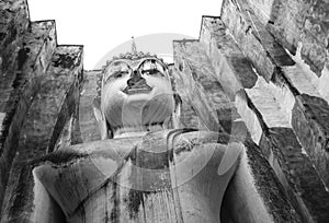 Buddhist status with square roofing in Sukhothai, Thailand.