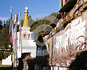 Buddhist stupa, prayer flags and Mani prayer wall