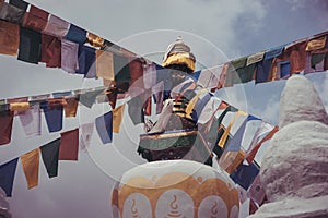 Buddhist stupa with tibetan prayer flags