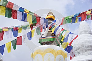 Buddhist stupa with tibetan prayer flags