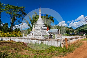 Buddhist stupa in a village near Hsipaw, Myanm photo
