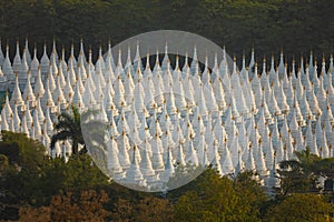 Buddhist stupas of Sanda Muni Pagoda seen from Mandalay Hill