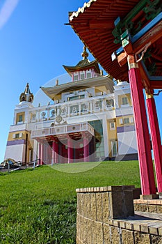 Buddhist temple Golden Abode of Buddha Shakyamuni against a blue sky