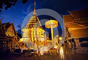 Buddhist Temple at night sky in Thailand photo