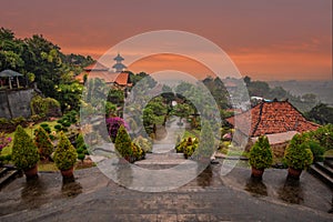 Buddhist temple in the rain. The Brahmavihara Arama Temple with beautiful gardens and monastery. Tropical plants, Banjar, Bali