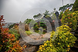 Buddhist temple in the rain. The Brahmavihara Arama Temple with beautiful gardens and monastery. Tropical plants, Banjar, Bali