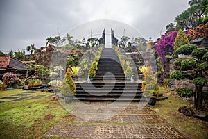 Buddhist temple in the rain. The Brahmavihara Arama Temple with beautiful gardens and monastery. Tropical plants, Banjar, Bali