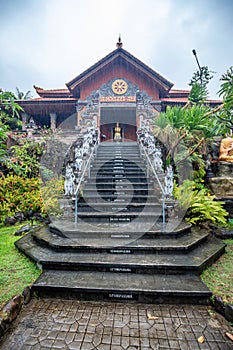 Buddhist temple in the rain. The Brahmavihara Arama Temple with beautiful gardens and monastery. Tropical plants, Banjar, Bali