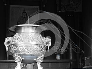 Buddhist temples are an important part of the Korean landscape. Most Korean temples burn incense photo