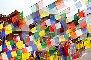 Buddhist Tibetan prayer flags lungta on Bodnath stupa