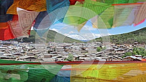 Buddhist tibetan prayer flags waving in the wind