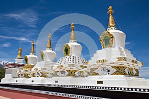 Buddhist white stupa and blue sky . Thiksey Monastery, Leh , Ladakh, India