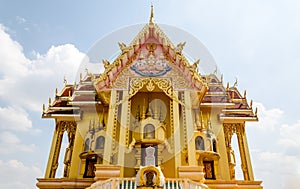 Buddist temple and blue sky in Thailand.