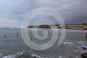 Bude in Cornwall during a stormy high tide.