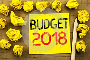 Budget 2018. Business concept for Household budgeting accounting planning written on sticky note paper on the vintage background.