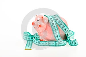 Budget crisis. Planning budget. Business problem. Limited or restricted. Credit loan debt. Piggy bank and measuring tape