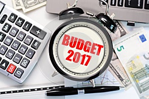 Budget exercise or forecast for the upcoming year of 2017 with old clock concept