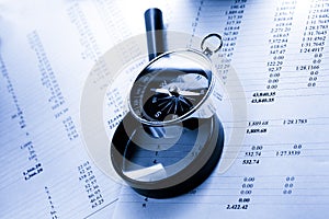 Budget, magnifying glass and compass