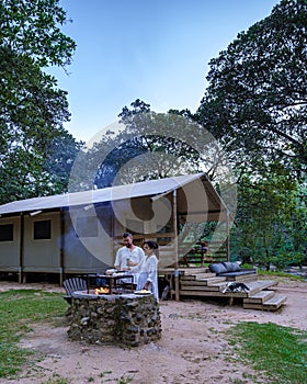 Budget Safarin tent in South Africa for families vacations, couple man and woman camping safari tent