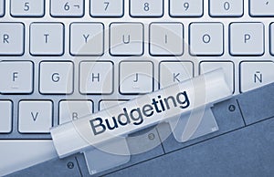 Budgeting - Inscription on Blue Keyboard Key