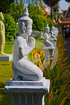 Budhas in the line at the temple