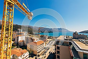 Budva building construction. Construction crane high-rise buildi