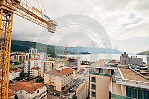 Budva building construction. Construction crane high-rise buildi