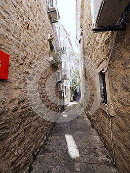 Budva old town, budva montenegro, budva, for sightseeing, clouds sky, old streets, ruins of buildings, balkan communities, balkans