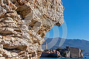 Budva - Unique pancake rock formations with panoramic view of the medieval old town of the coastal city of Budva